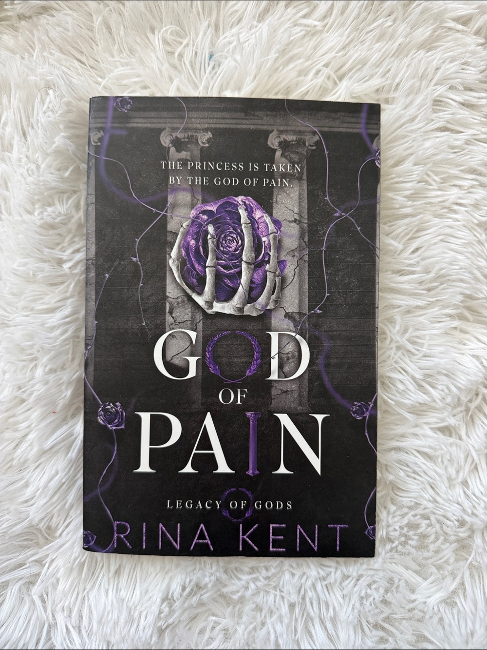 God of Pain by Rina Kent - Black & Purple Paperback